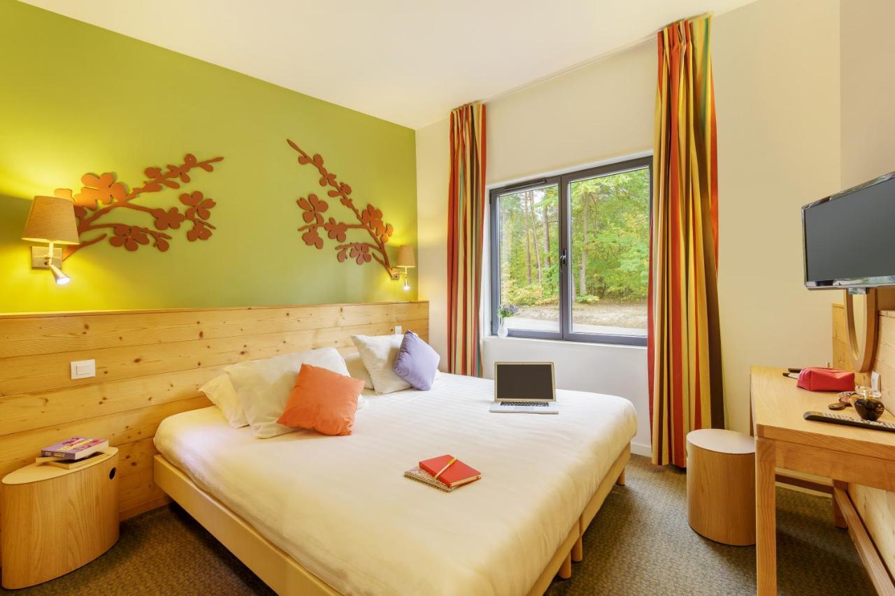 Center Parcs Les Hauts De Bruyeres Шомон-сюр-Тарон Экстерьер фото