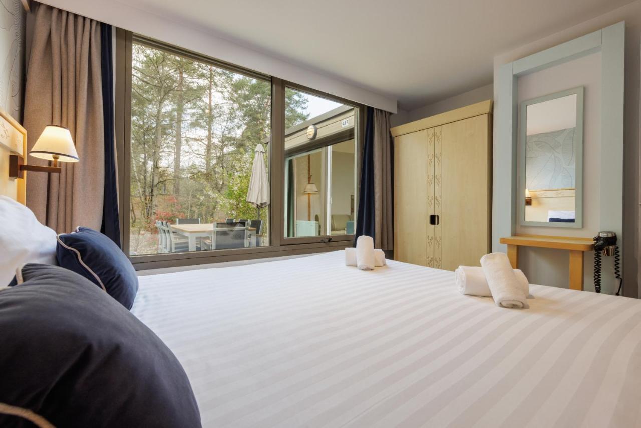 Center Parcs Les Hauts De Bruyeres Шомон-сюр-Тарон Экстерьер фото
