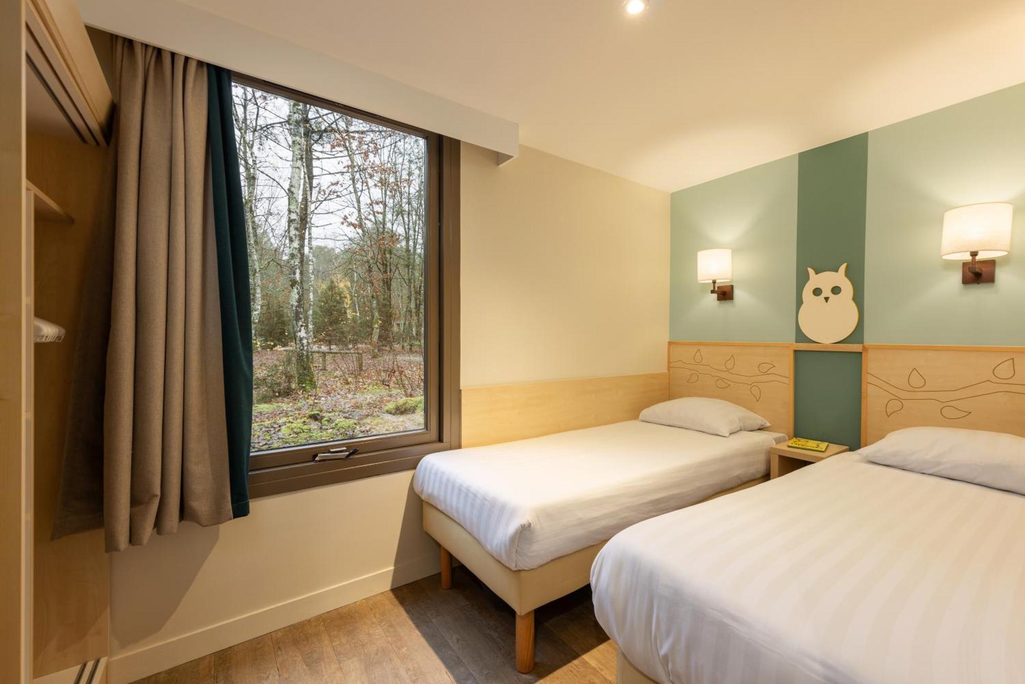 Center Parcs Les Hauts De Bruyeres Шомон-сюр-Тарон Экстерьер фото